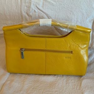 HOBO International, NWT Clara clutch, marigold